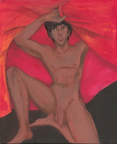 Chico tumbado sobre fondo rojo