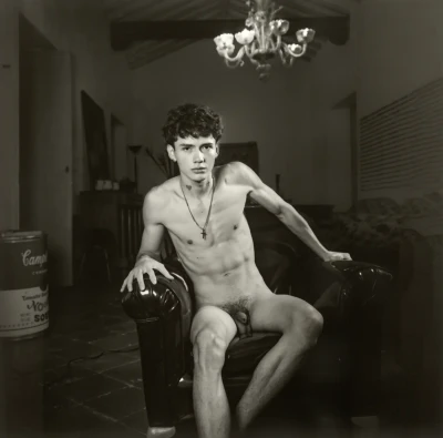 Jhojan in the Black Armchair